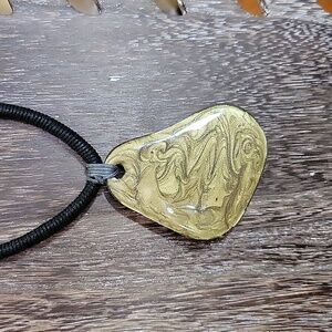 Women's necklace resin pendant.